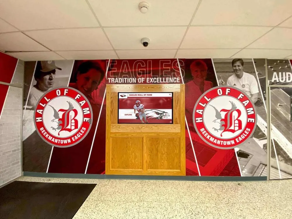 Traditional alumni wall installation