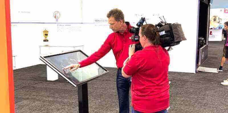 Professional filming interactive museum touchscreen kiosk Museum touchscreen exhibit demonstration